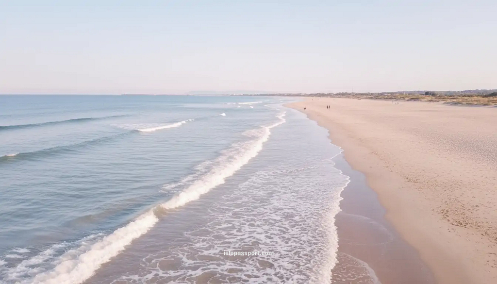 Follonica long sandy beach with calm shallow water