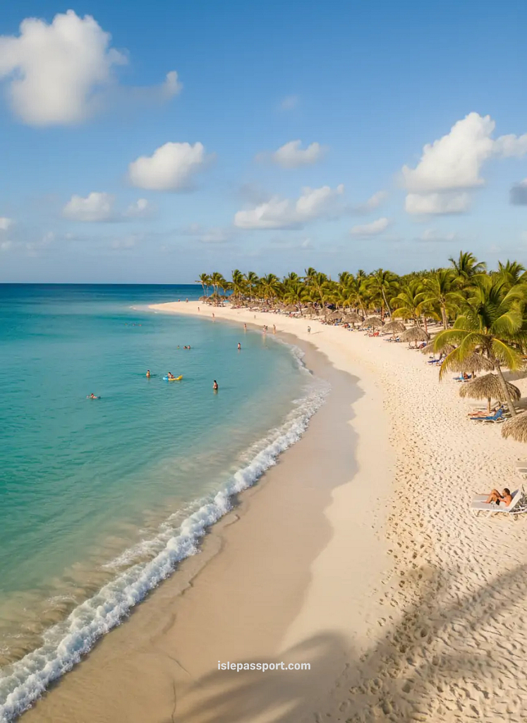 White-sand Divi Beach in Aruba with swimmers and turquoise Caribbean water