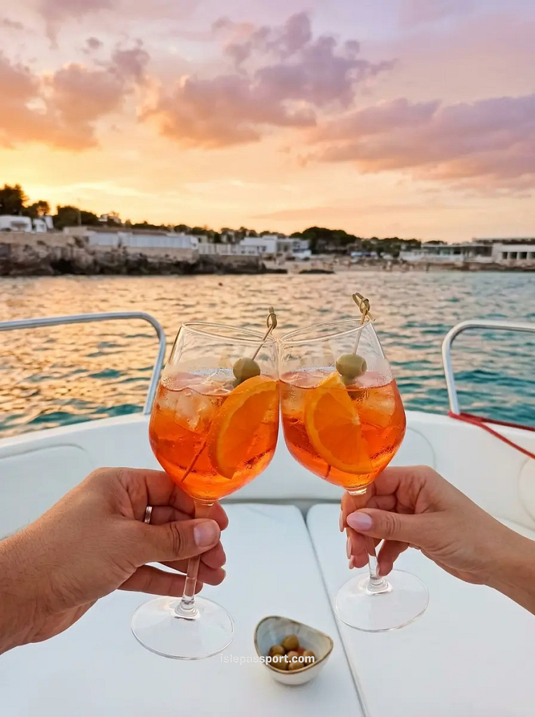Couple having aperitivo by the sea on the Italian coast