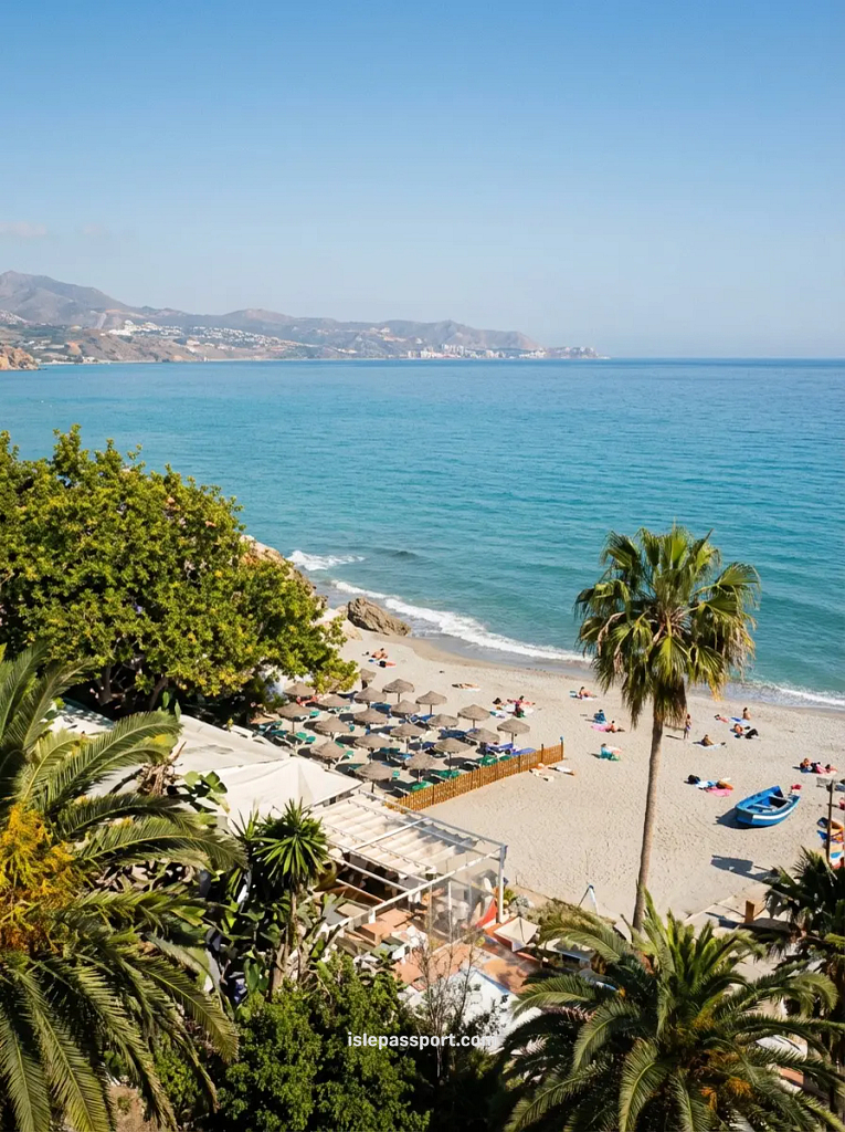 Palm-lined beach in Rincón de la Victoria, a quiet coastal town on the Costa del Sol