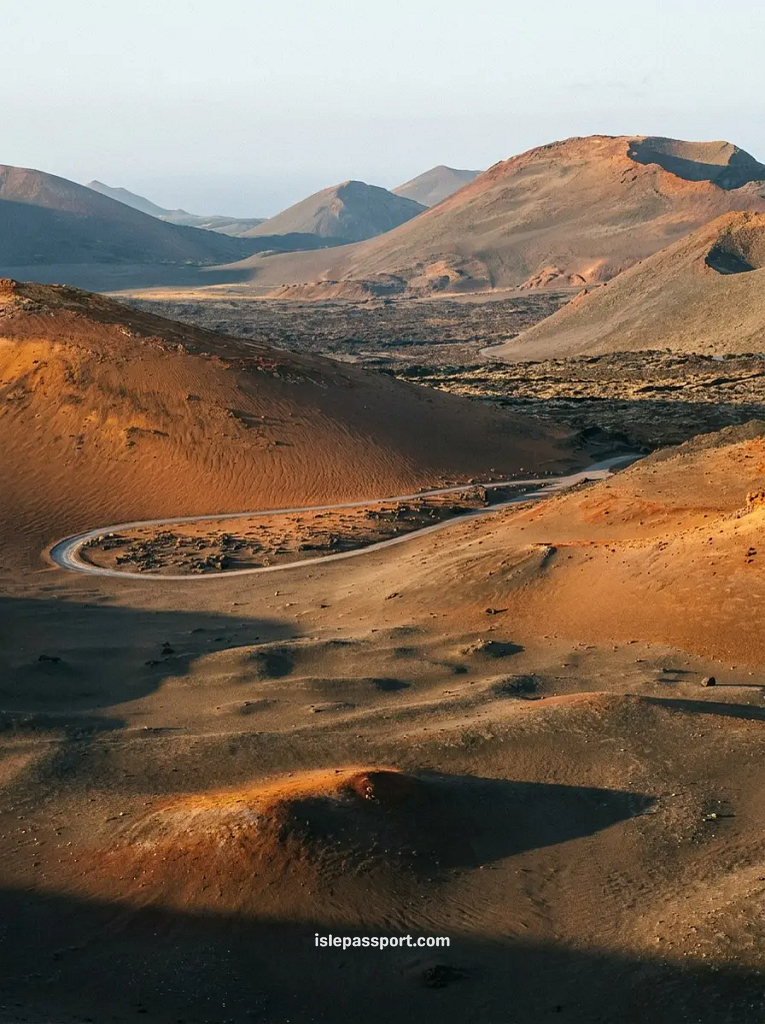 Volcanic landscape near Timanfaya in Lanzarote in winter with long shadows from the low sun