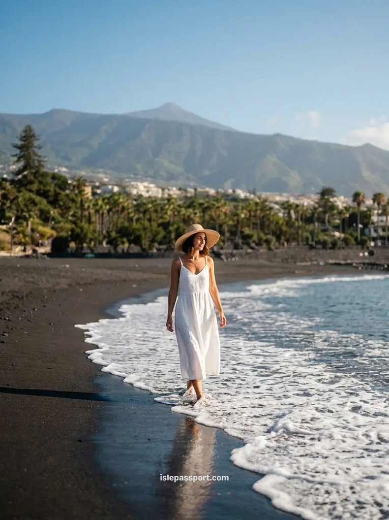 Black sand at Playa Jardín in Puerto de la Cruz with Teide behind, north Tenerife